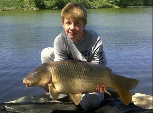 Olie Cox, 27Lb caught below an overhanging tree from the A2 swim - 2 May 2011
