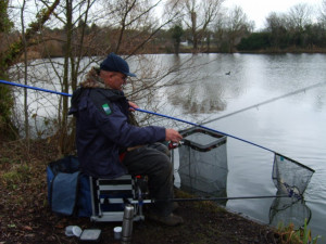 Paul Cooper, landing a skimmer, using a feeder rod