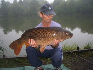 Andy King Sutton small lake 18Lb 4oz on 8lb line 24.8.13