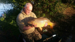 Graham King 20Lb 4oz Big Lake on the river bank using a TNM wafter 7.5.16