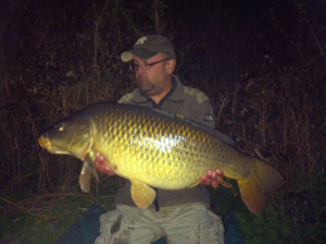 Mark Harris with The Big Common from Sutton Big Lake at 32lb caught on Poachers Tigernut & Maple on 16.03.12