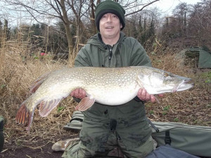 Sean Elliott - Sutton car park lake centre path swim with big iron drain cover - 25lb caught on ledgered sprat 11.1.12 