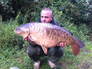 Gary Bainbridge 27Lb mirror Sutton small lake, during the Carp match where 13 of the 14 fish were caught on Poacher Baits - 27-8-11 