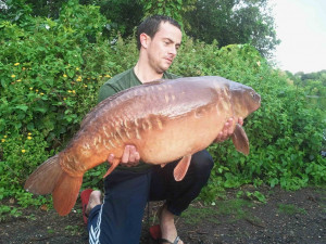 Sam Field with the Unknown at 35Lb 4oz from Sutton small lake 27.8.11